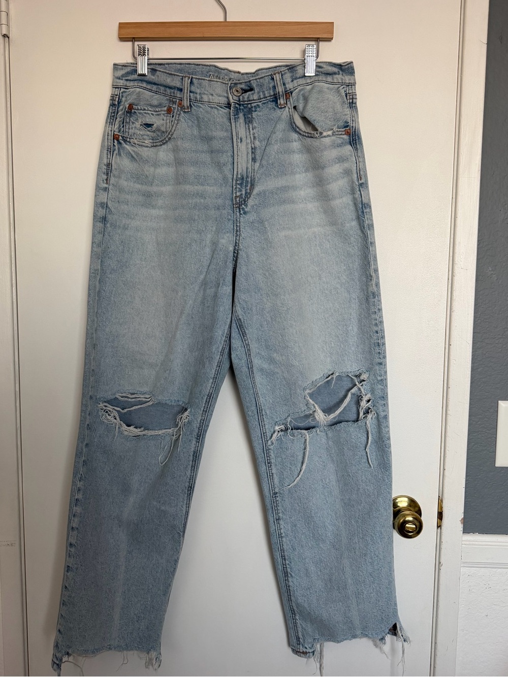 American Eagle Outfitters High Rise Light Wash Distress Denim Jeans with Raw Hem